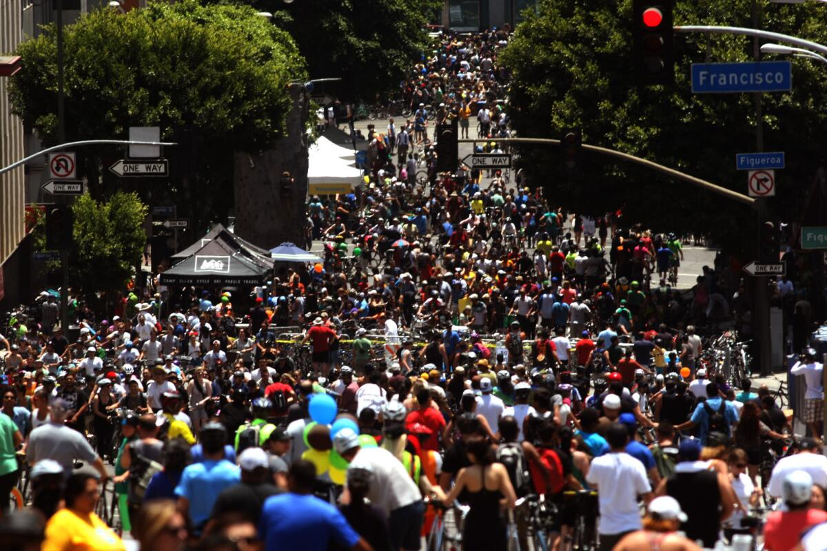A large Los Angeles community gathering filling a downtown street